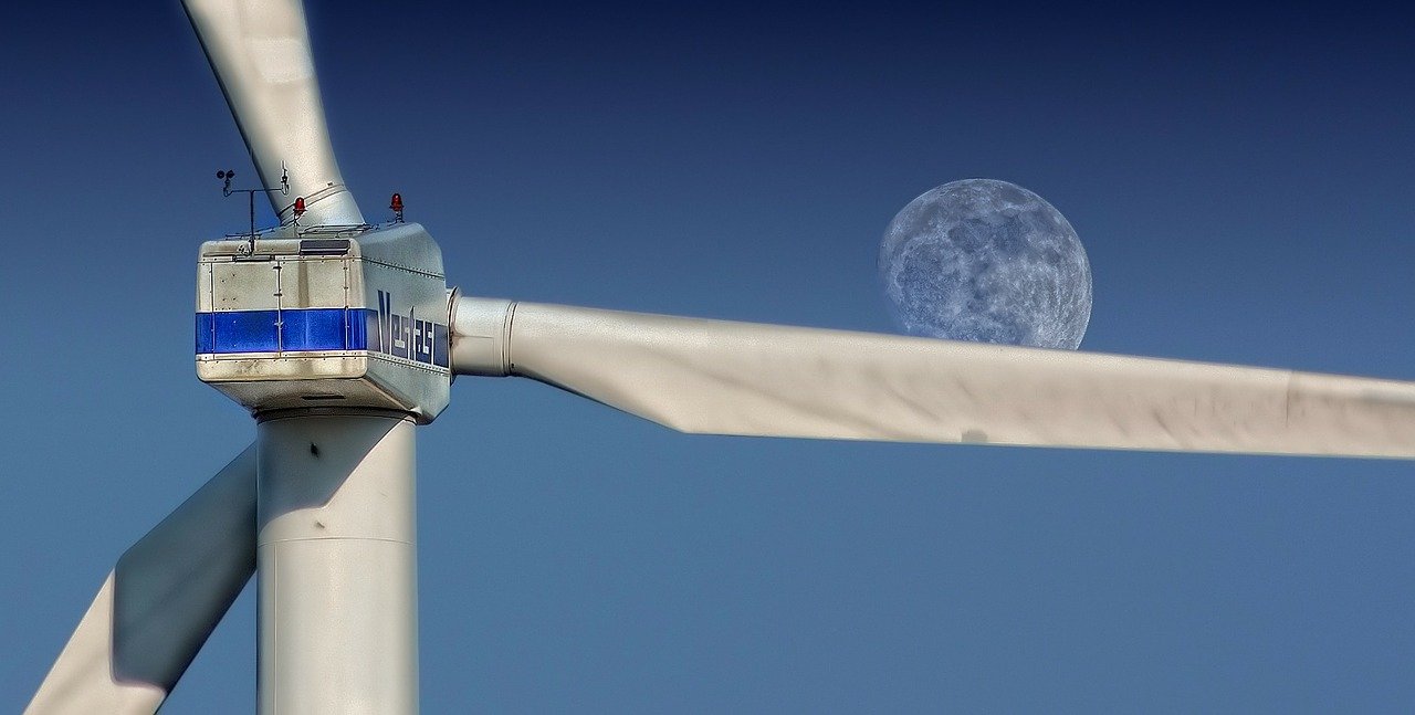 wind mill with moon in background