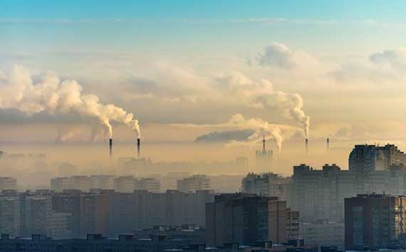 Burning Fossil Fuels | City View Factories in Distance