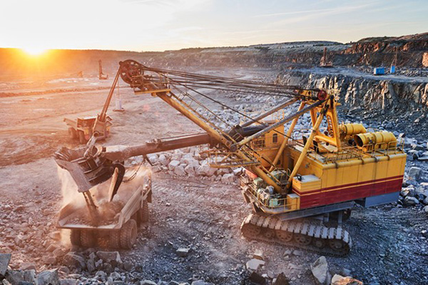 Consuming Resources Photo of Industrial Machine in Quarry