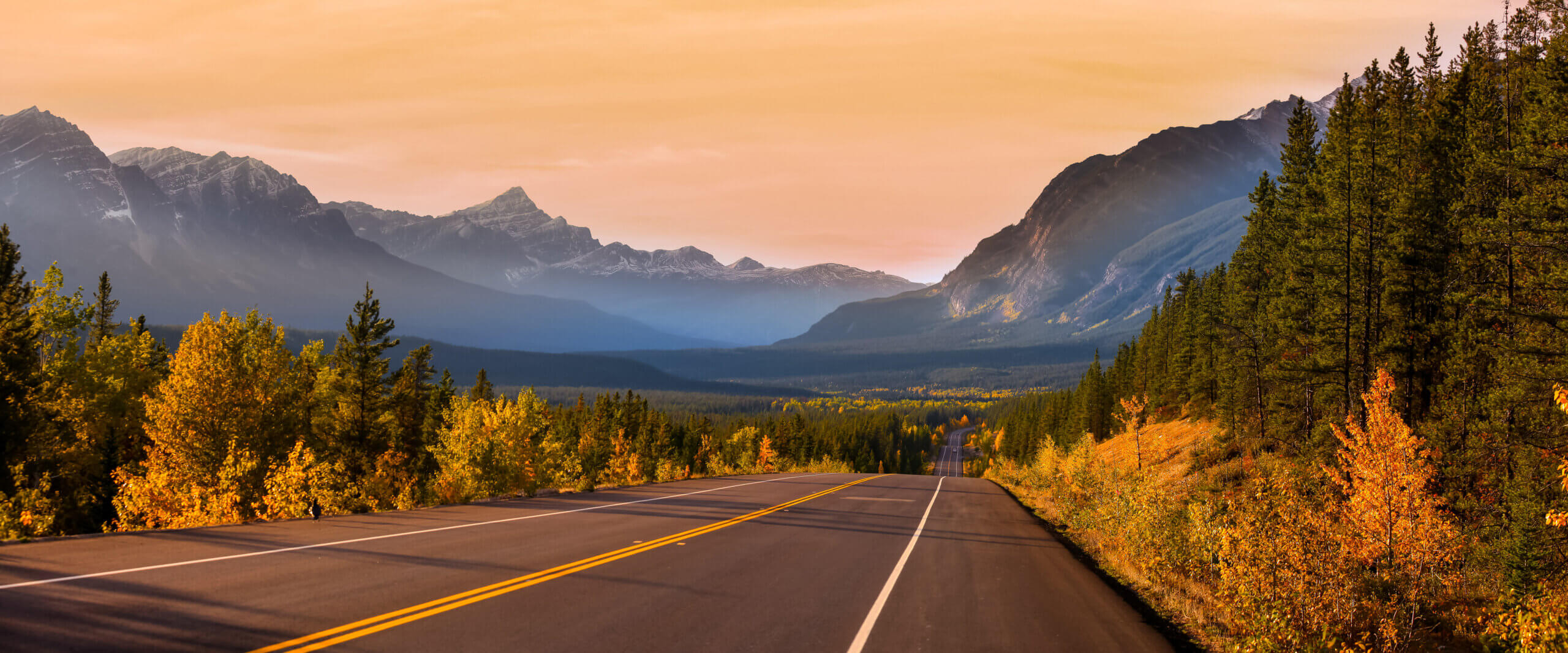 Scenic mountain road with autumn foliage
